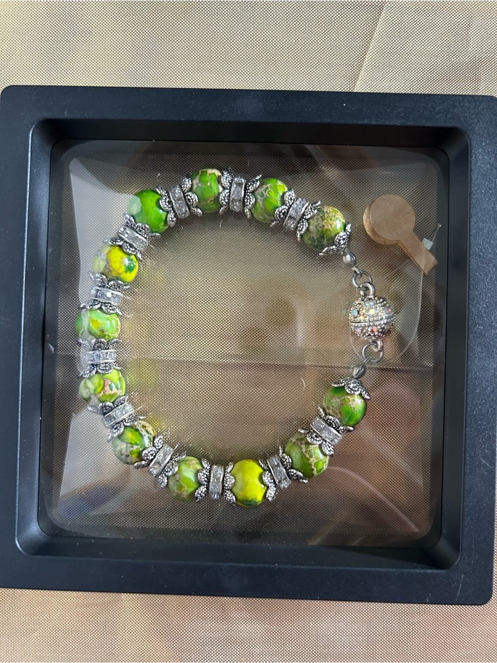 Green Beaded Stretch Bracelet with Silver Accents
